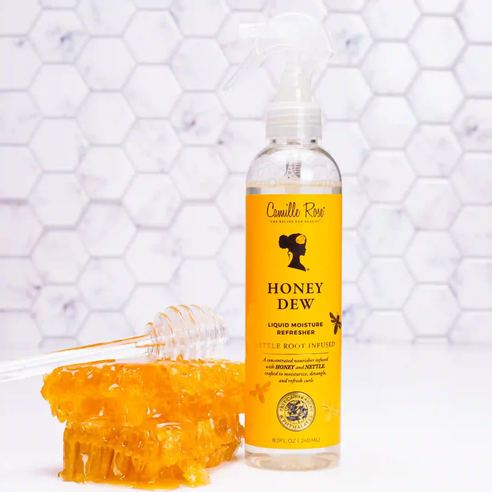 Honey Dew-Liquid Moisture Refresher Camille Rose with honey and nettle root to moisturize, soothe, and refresh natural hair.