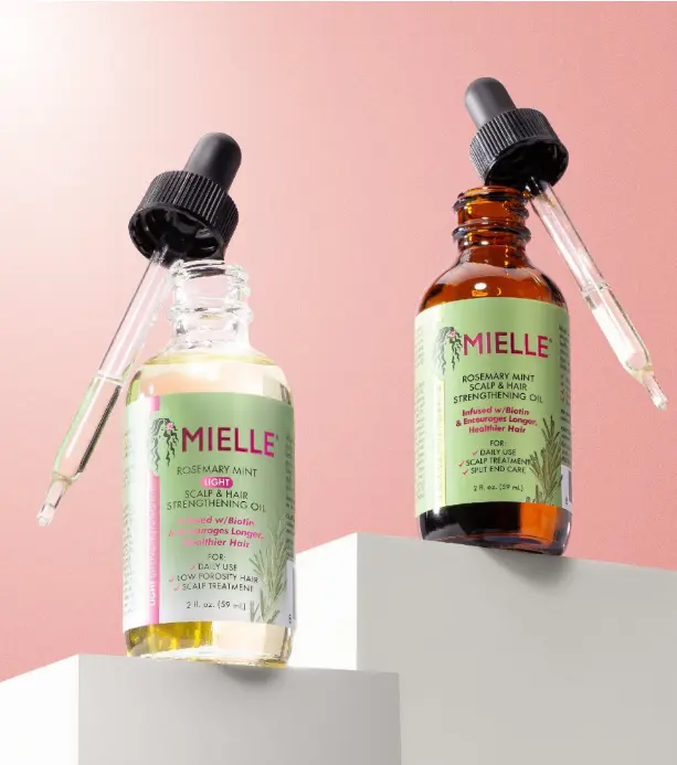 Rosemary Mint Light Scalp & Hair Strengthening Oil with biotin to nourish scalp, add shine, and support longer, stronger, healthier hair.