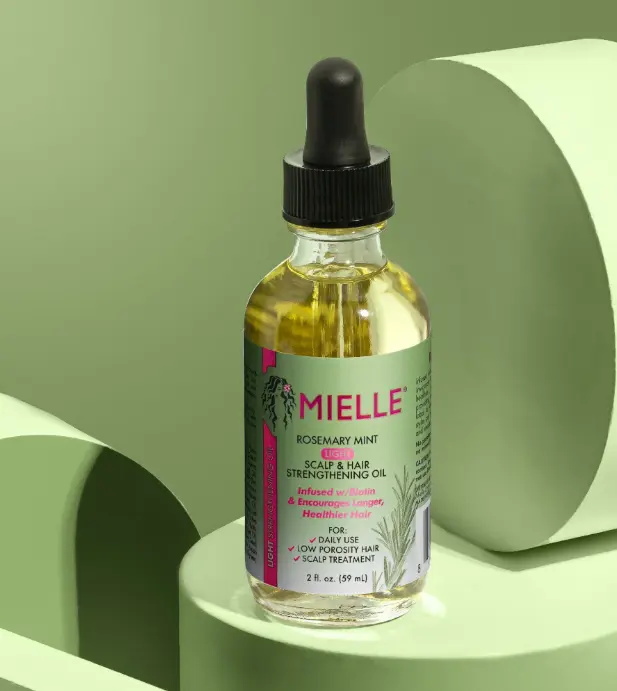 Rosemary Mint Light Scalp & Hair Strengthening Oil with biotin to nourish scalp, add shine, and support longer, stronger, healthier hair.