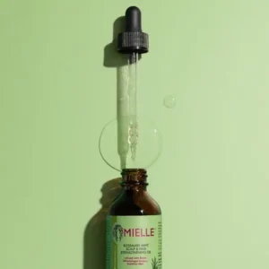 Rosemary Mint Scalp & Hair Strengthening Oil – nutrient-rich biotin formula to nourish scalp, smooth split ends & support protective styles.