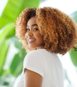 Mielle Rosemary Mint Strengthening Leave-In Conditioner with Biotin and Rosemary for hydration, strength, and moisture.