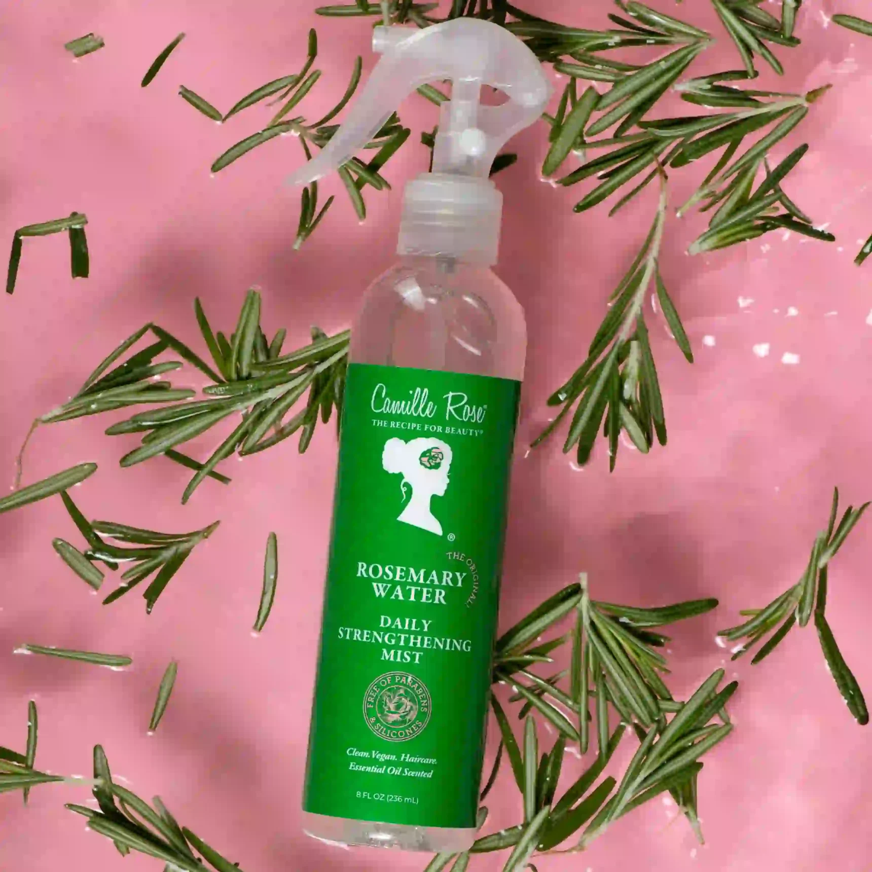 Rosemary Water Daily Strengthening Mist Camille Rose with biotin, peppermint, and amla to stimulate follicles, reduce scalp inflammation, and strengthen hair.